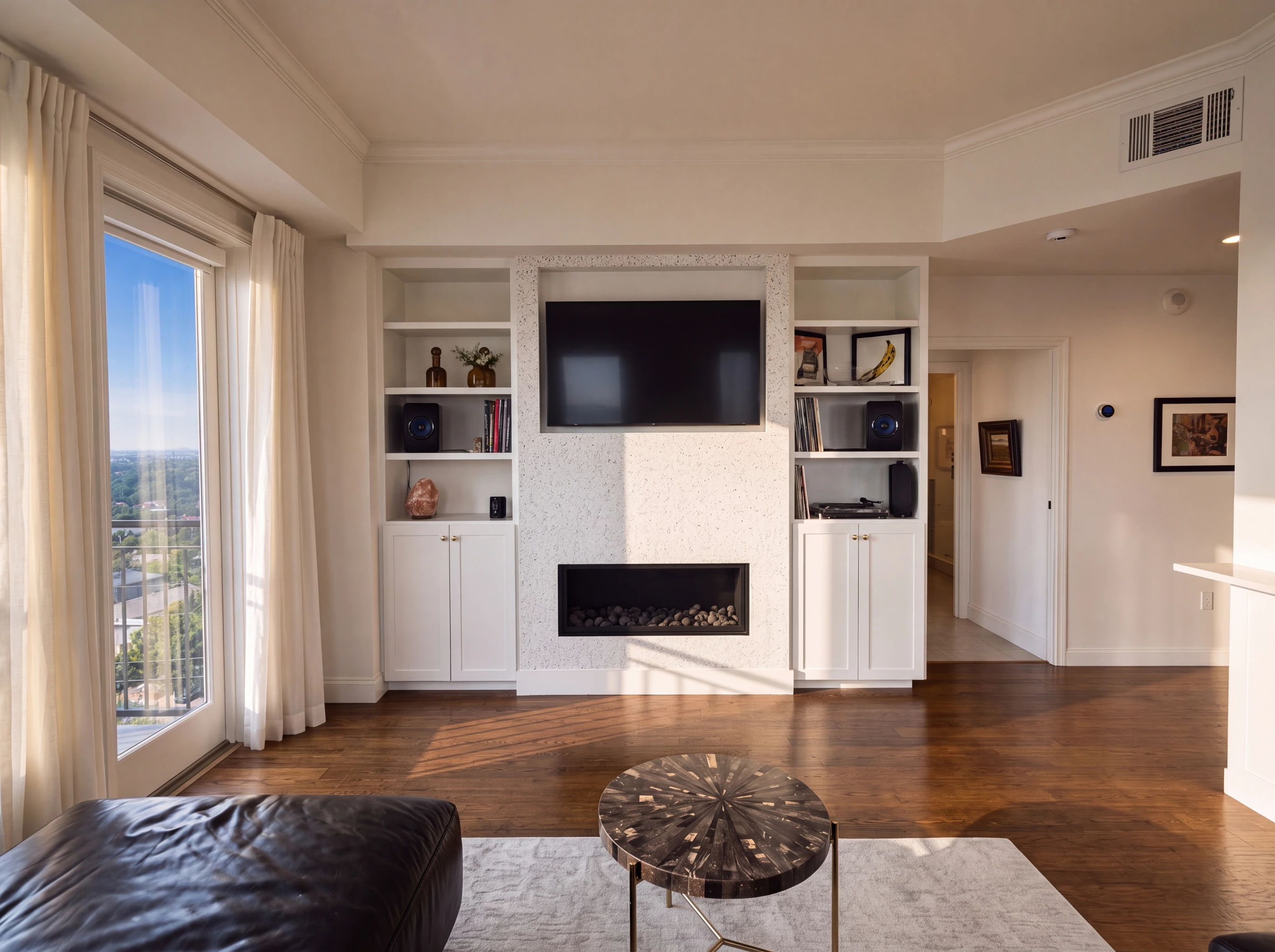 Living room with linear gas fireplace and built-ins at 4611 Travis Street #1100